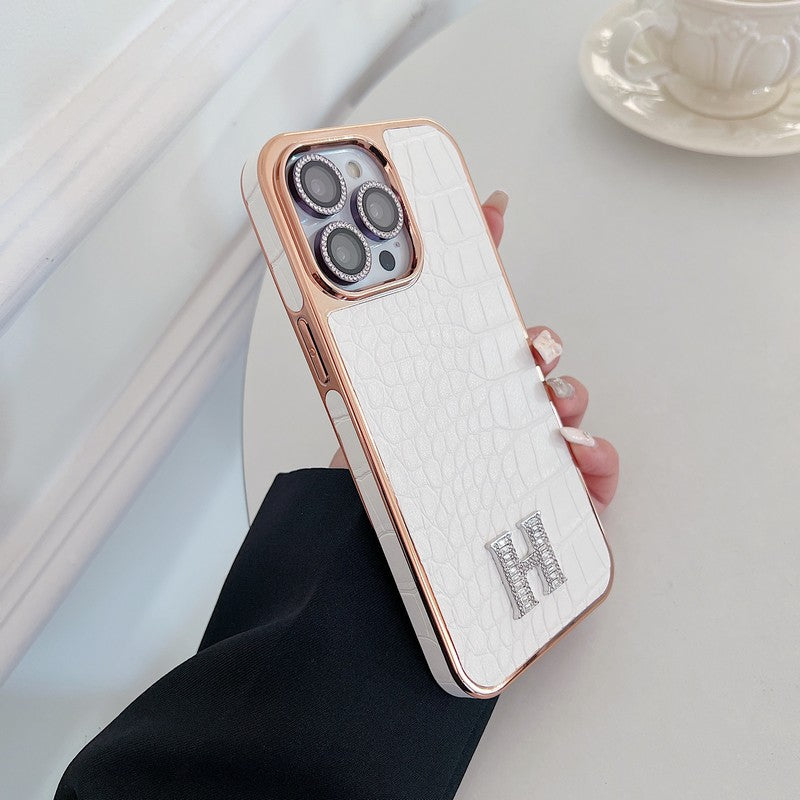 Capa para iPhone em ouro rosa com logotipo clássico de diamante