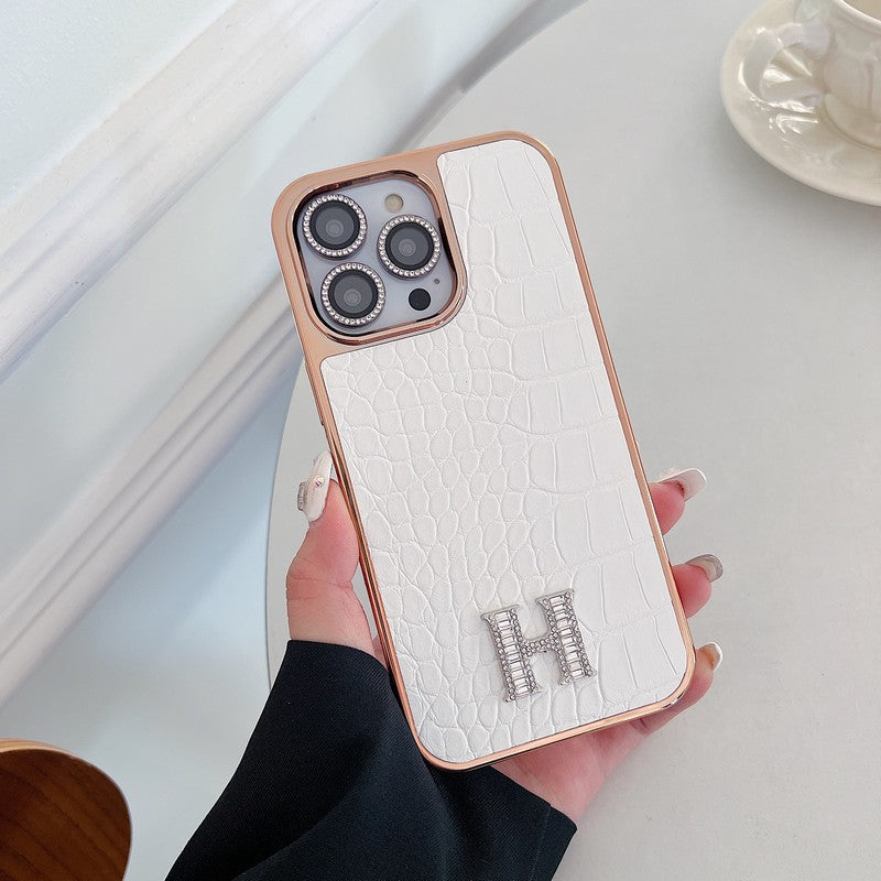 Capa para iPhone em ouro rosa com logotipo clássico de diamante